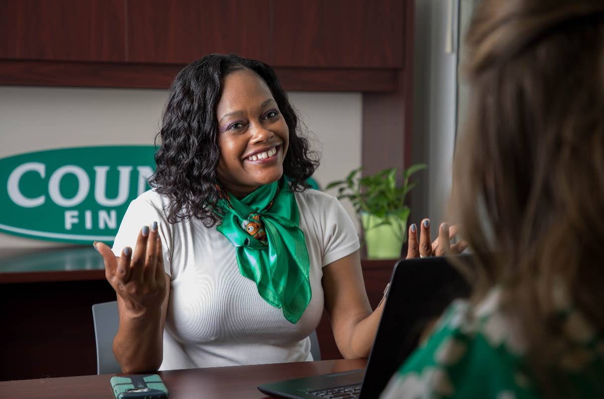 Smiling female Country Financial Insurance agent