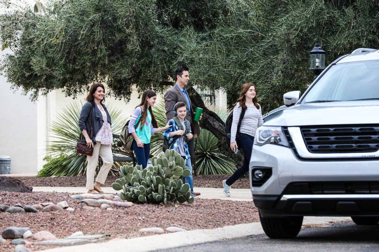 Phoenix family walking to car